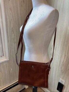 Ashwood Vintage Leather Crossbody Bag with a Distinctive Silver Deer Emblem